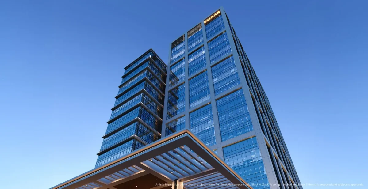 Glass-fronted office towers with Emaar signage and an entrance canopy, Emaar India Business Centre, Gurugram