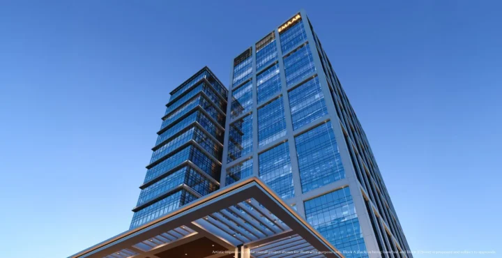 Glass-fronted office towers with Emaar signage and an entrance canopy, Emaar India Business Centre, Gurugram